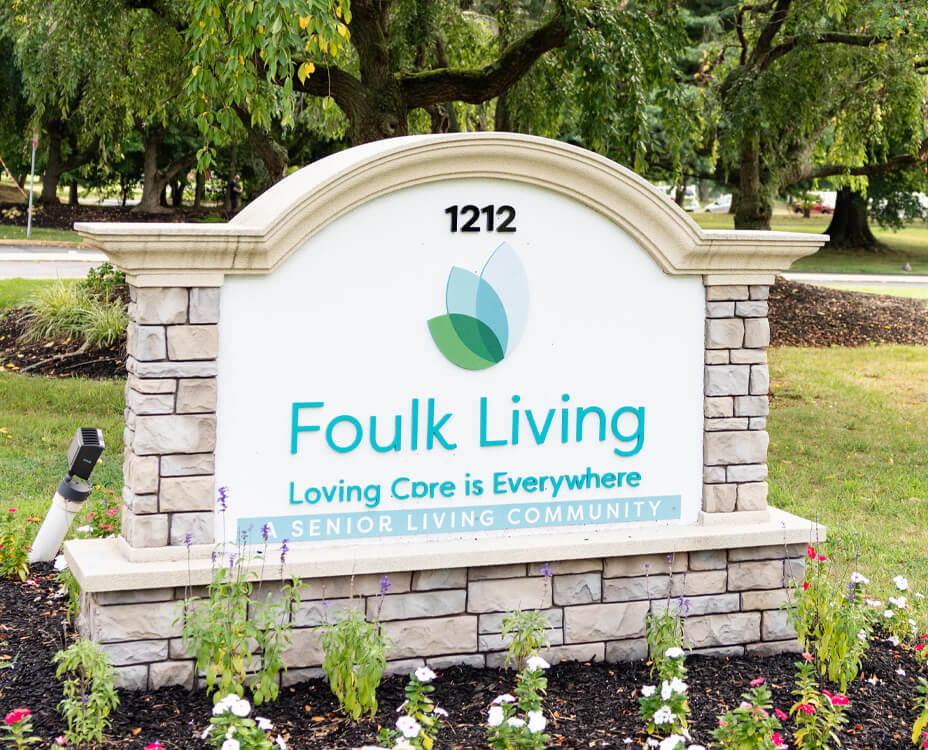 Foulk Living sign