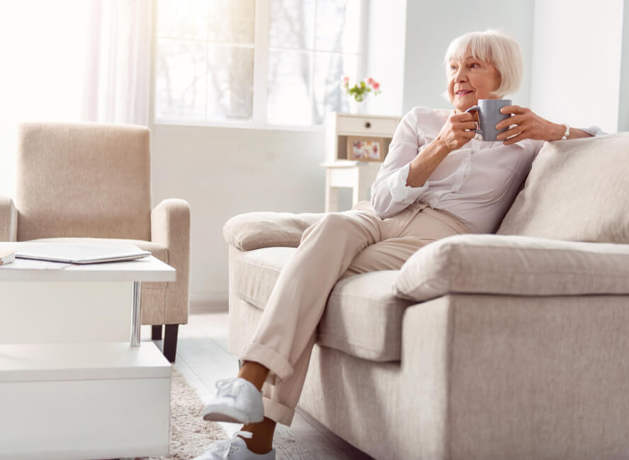 senior woman enjoying a cup of coffee